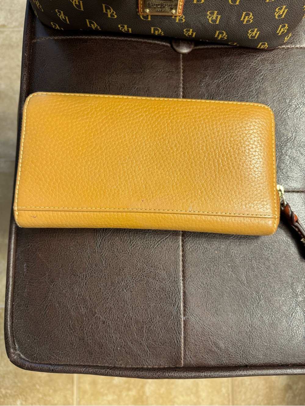Dooney & Bourke Monogram Gretta Drawstring bag with Tan Trim and Red Lining - Picture 9 of 10